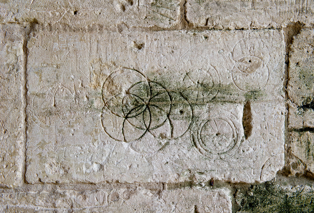 Apotropaic Marks Daisy-Wheels © Historic England